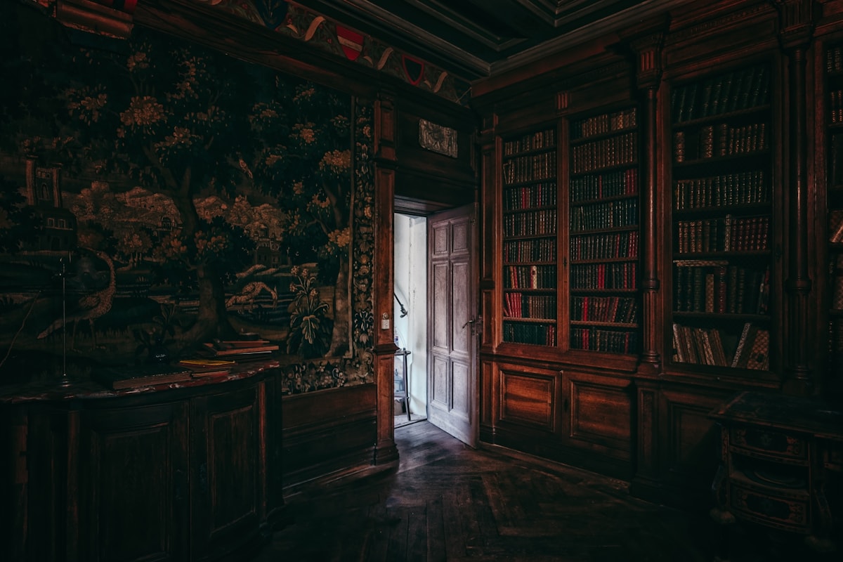 two side-by-side rooms, one scholarly, one rustic